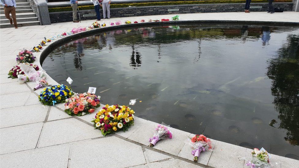 Floral tributes placed in the Omagh bomb memorial garden