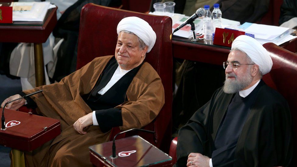 Akbar Hashemi Rafsanjani (L) and Hassan Rouhani (R)