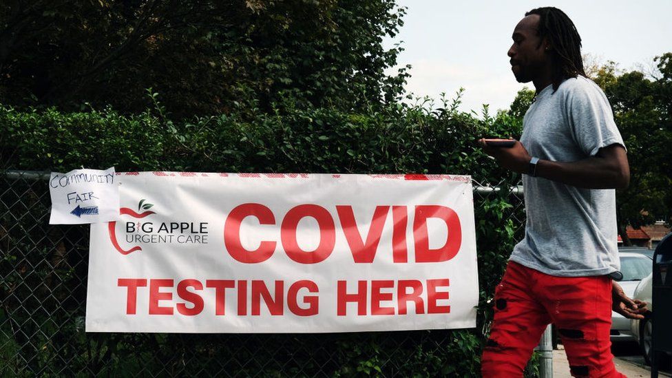 A sign directs people to a Covid-19 testing site on 14 September 2020 in the Brooklyn borough of New York City