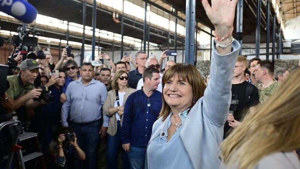 Candidate Patricia Bullrich (R) from the center-right 'Together for Change' party, greets supporters after voting in the general elections in Buenos Aires, Argentina, 22 October 2023.