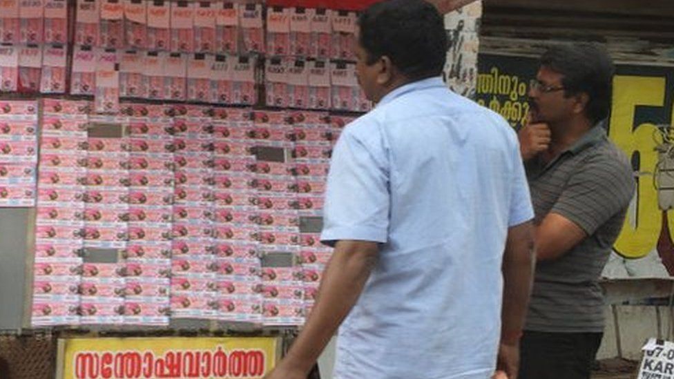 Man selling lottery tickets in the city of Thiruvananthapuram (Trivandrum), Kerala, India.