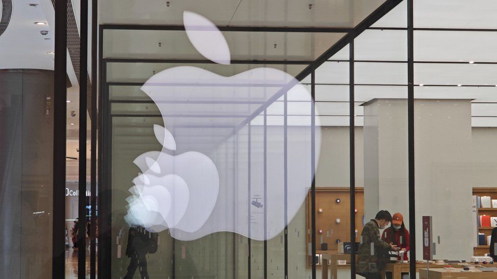 The reflection of the logo of Apple.