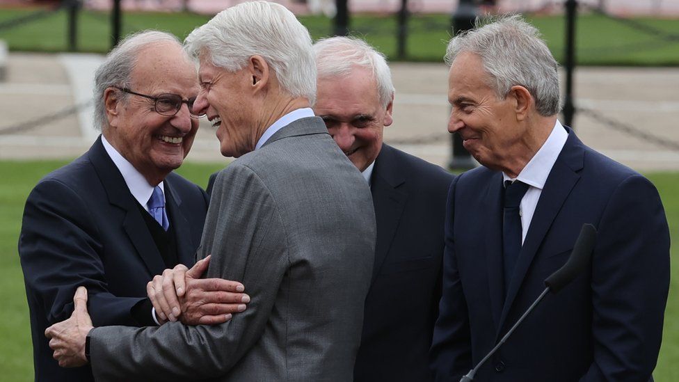 Former senator George Mitchell, President Bill Clinton, former Taoiseach Bertie Ahern and former Prime Minister Tony Blair in Belfast