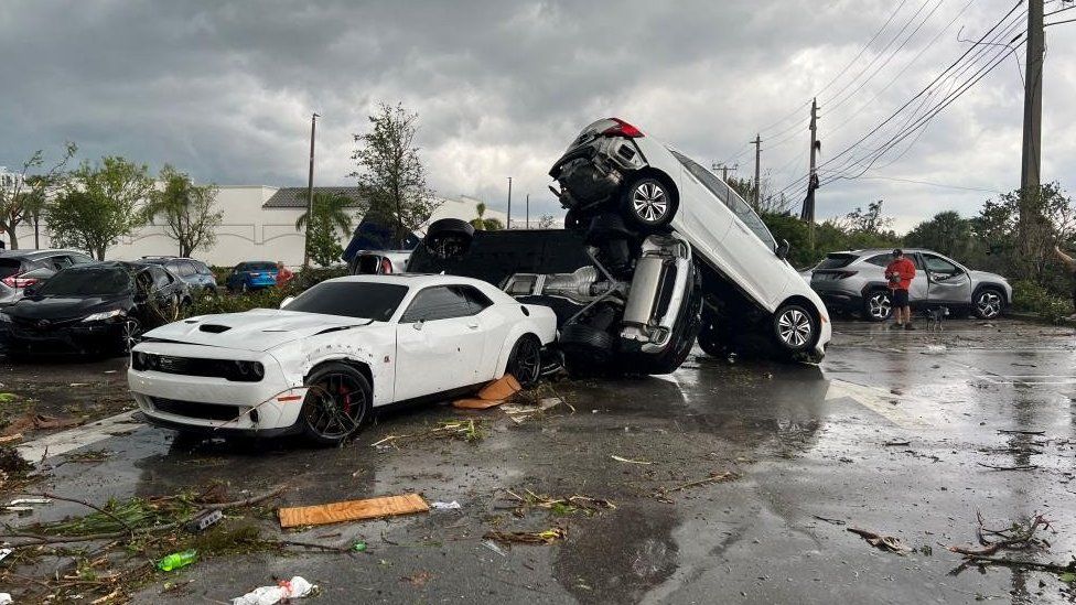 View of vehicles piled up   astatine  a parking batch  pursuing  a suspected tornado, successful  Palm Beach Gardens, Florida, U.S., April 29, 2023