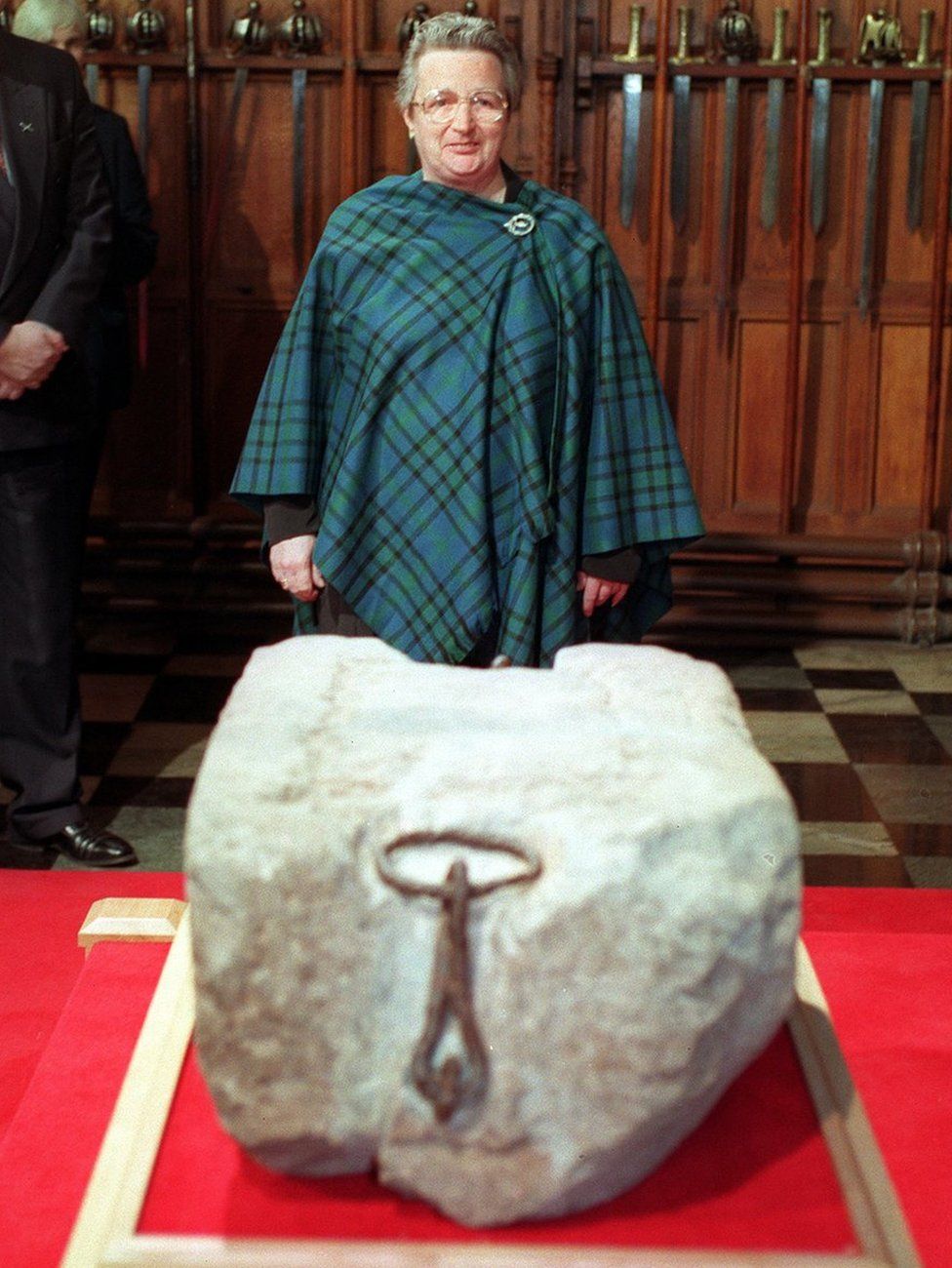 Kay Matheson, one of the four who stole the Stone of Destiny at Christmas 1950, welcomes the Stone back to Scotland during a ceremony at Edinburgh Castle in 1996