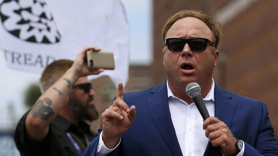Alex Jones from Infowars.com speaks during a rally in support of Republican presidential candidate Donald Trump near the Republican National Convention in Cleveland, Ohio, 18 July 2016.