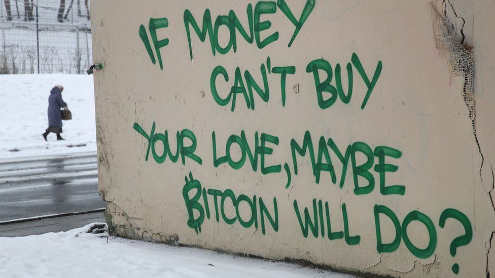 Graffiti on the outskirts of Vilnius reads: 'If money can't buy your love, maybe Bitcoin will do?', February 17 2018