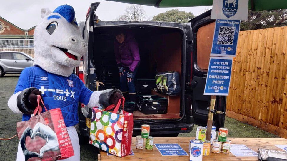 Ipswich Town mascot collecting foodbank donations