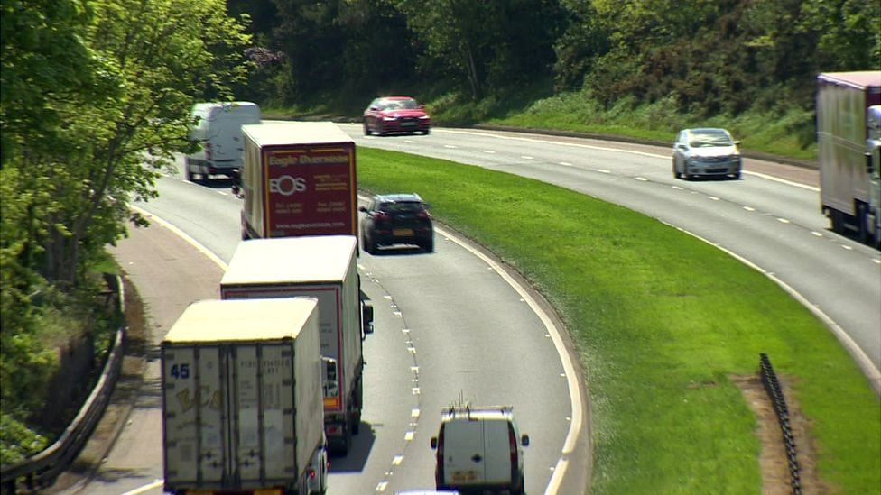 Vehicles travelling along a busy dual carriageway