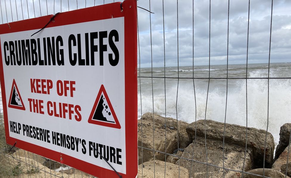 A warning sign telling people to keep off the cliffs at Hemsby, Norfolk