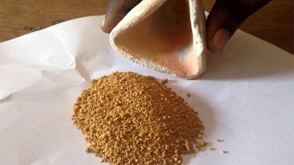 An artisanal trader shows gold being prepared for smelting in Tarkwa, Ghana (photo released on 2 October 2015)