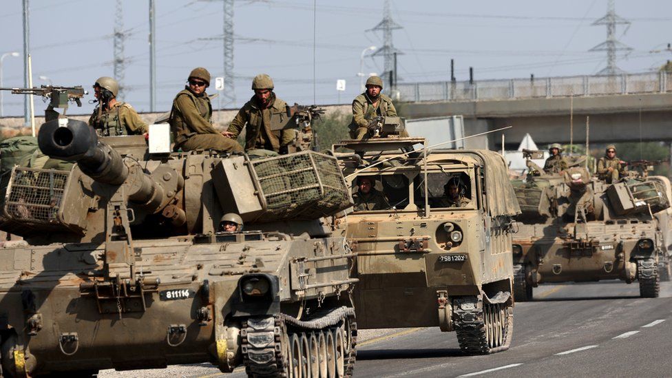 Israeli tanks and soldiers near Gaza