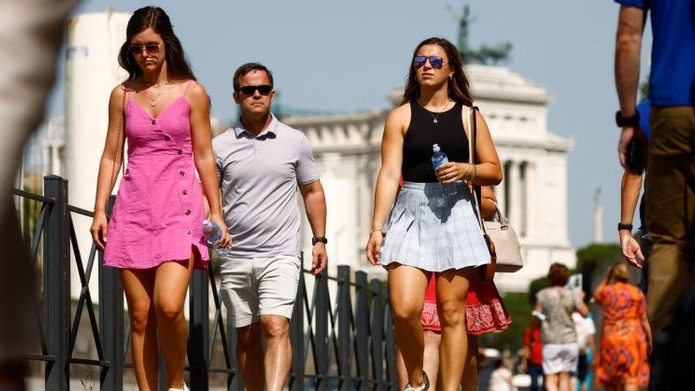 People walk without face masks in Rome, Italy. Photo: June 2021