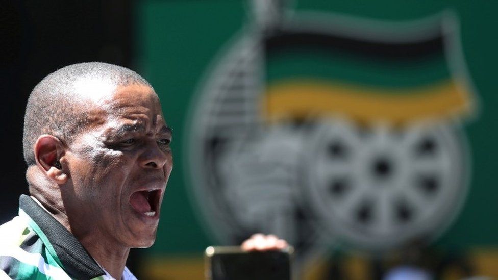 Ace Magashule, the secretary general of South Africa's ruling African National Congress, addresses university students during a protest in Johannesburg