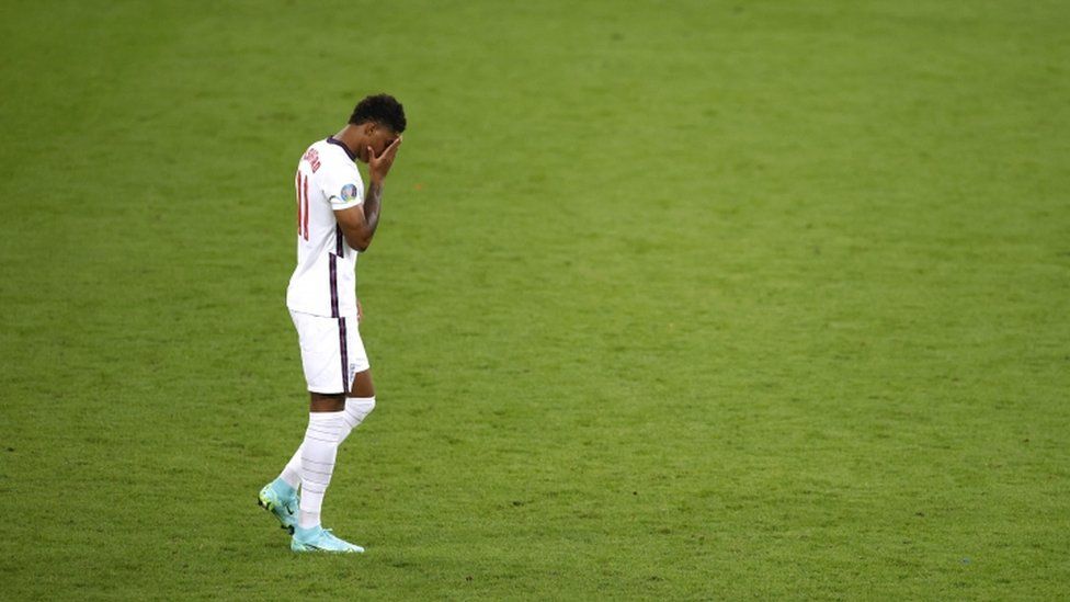 England's Marcus Rashford looks dejected after missing a penalty