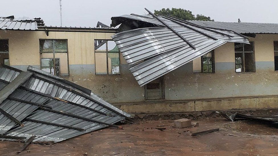 Corrugated iron roof blown off class in Mozambique