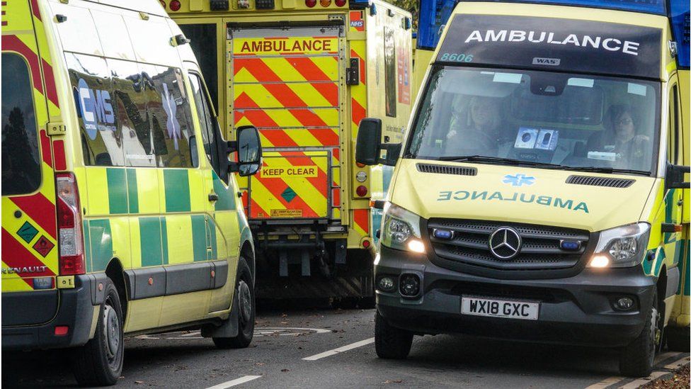 Ambulances queue outside the accident and emergency department of the Bath Royal United Hospital