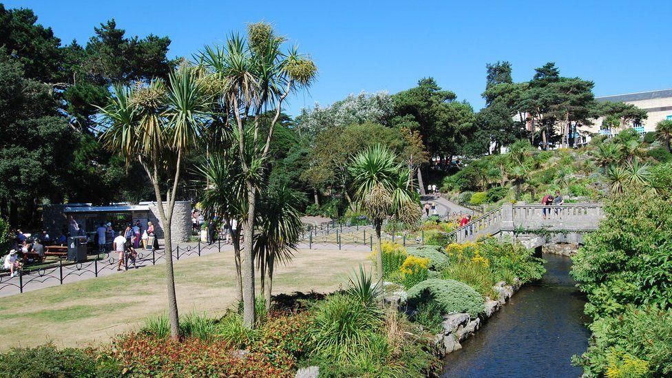 Bournemouth's Lower Gardens, showing the River Bourne running alongside rich green plants