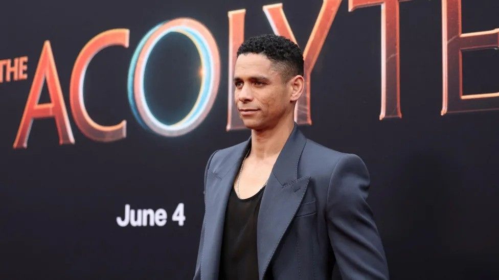 Actor Charlie Barnett posing for the press at the launch of The Acolyte