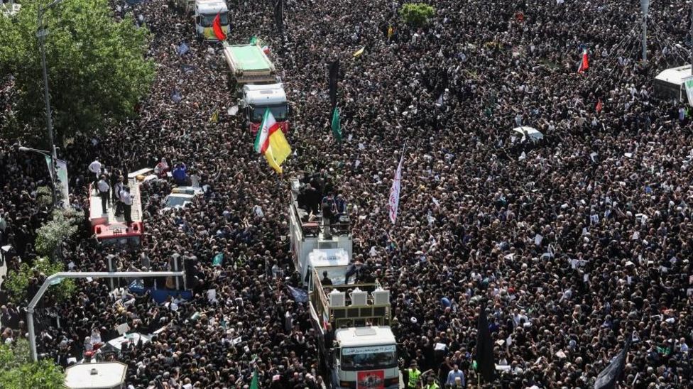 Iran's supreme leader leads prayers at Ebrahim Raisi funeral - BBC News