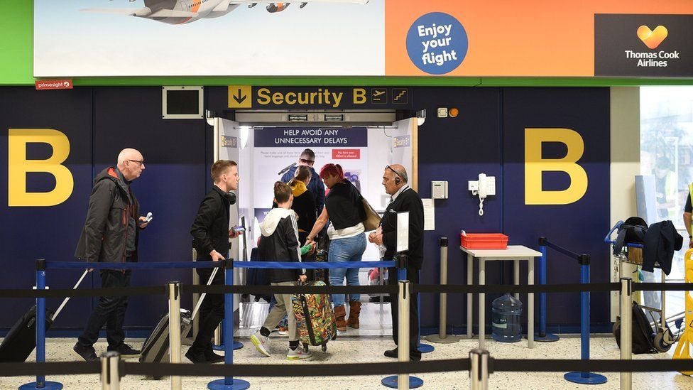 Manchester Airport warns delays could last for several weeks - BBC News