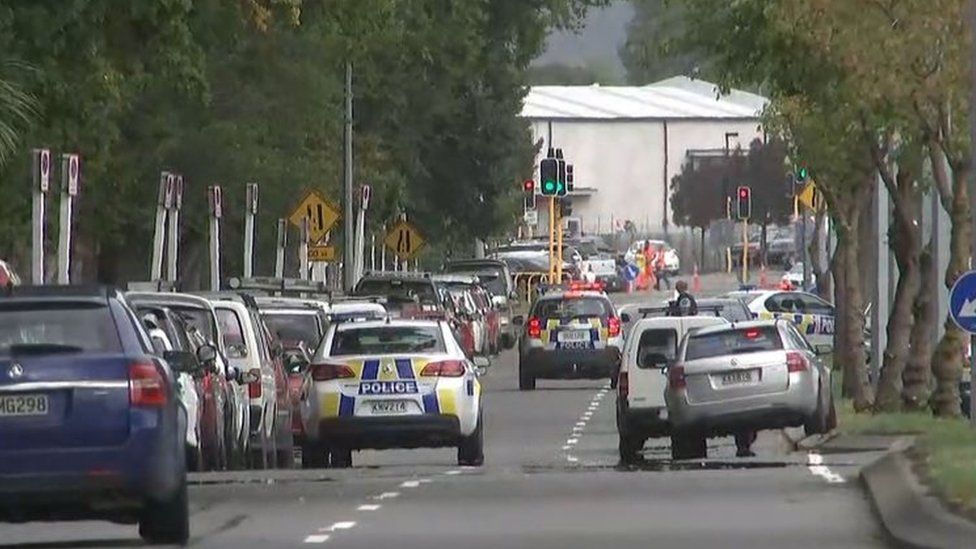 Police on a street outside a mosque in Christchurch, New Zealand, on Friday