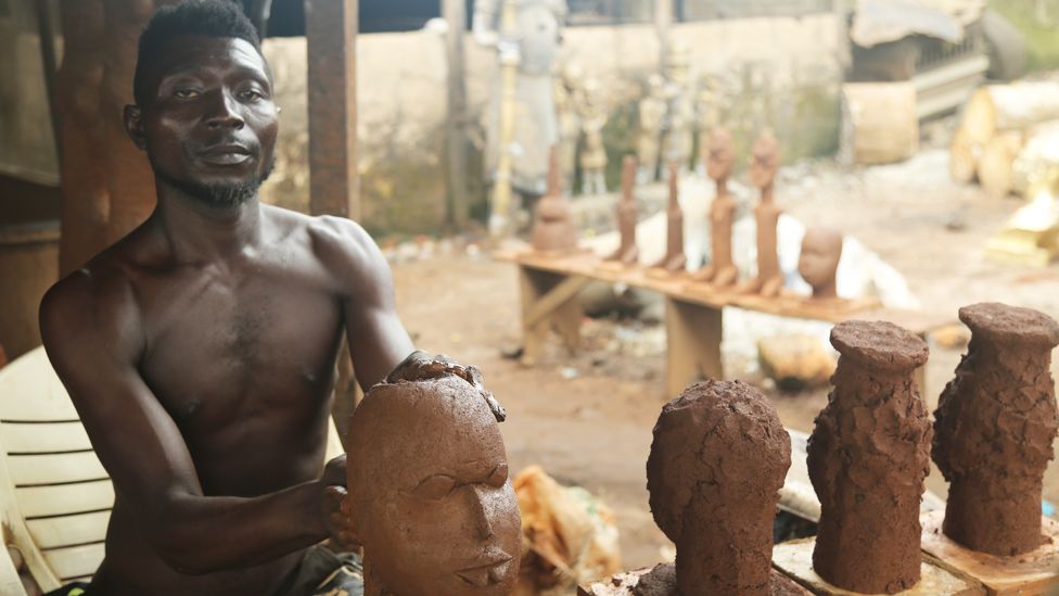 A worker at Monday Aigbe's foundry in Benin City, Nigeria