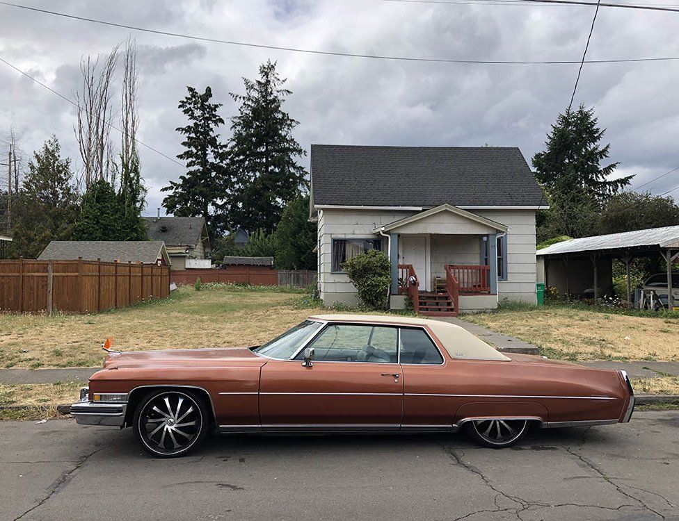 Car in front of a house