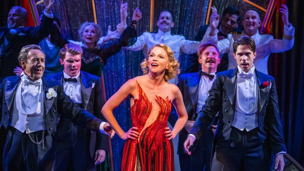 Sutton Foster (centre) with other members of the Anything Goes cast