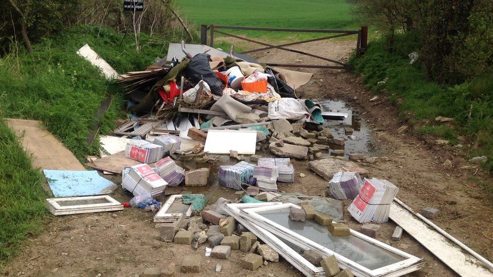 Fly-tipping on access road