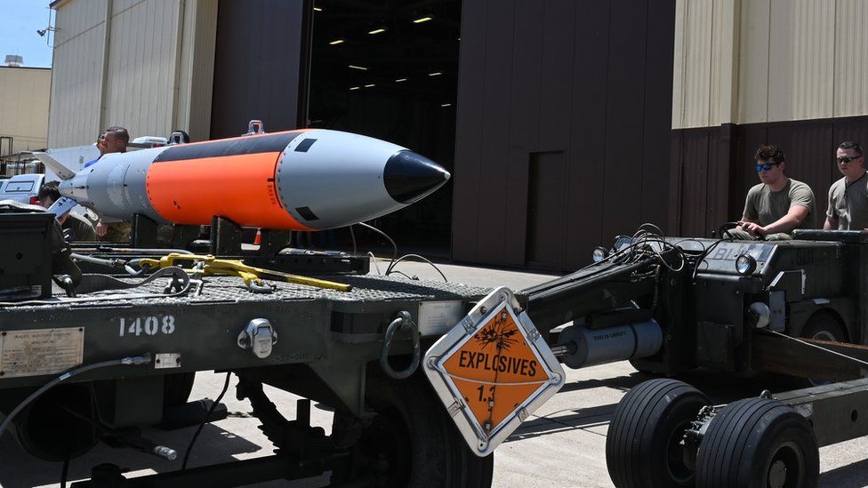 Thermonuclear bomb being loaded onto an aircraft