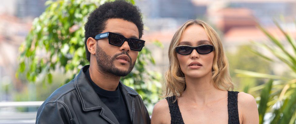 Abel 'The Weeknd' Tesfaye and Lily-Rose Depp attend "The Idol" photocall at the 76th annual Cannes film festival at Palais des Festivals on May 23, 2023 in Cannes, France