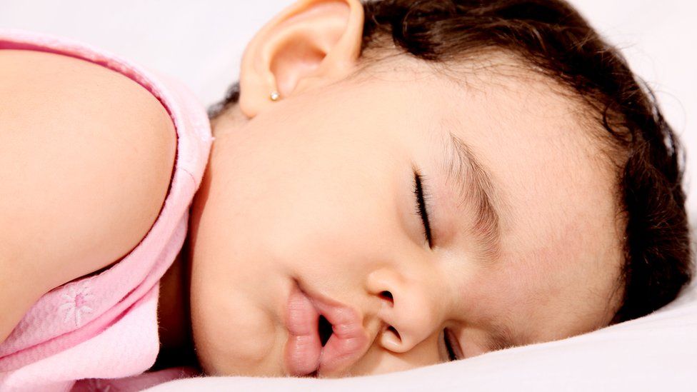 Toddler asleep with mouth open