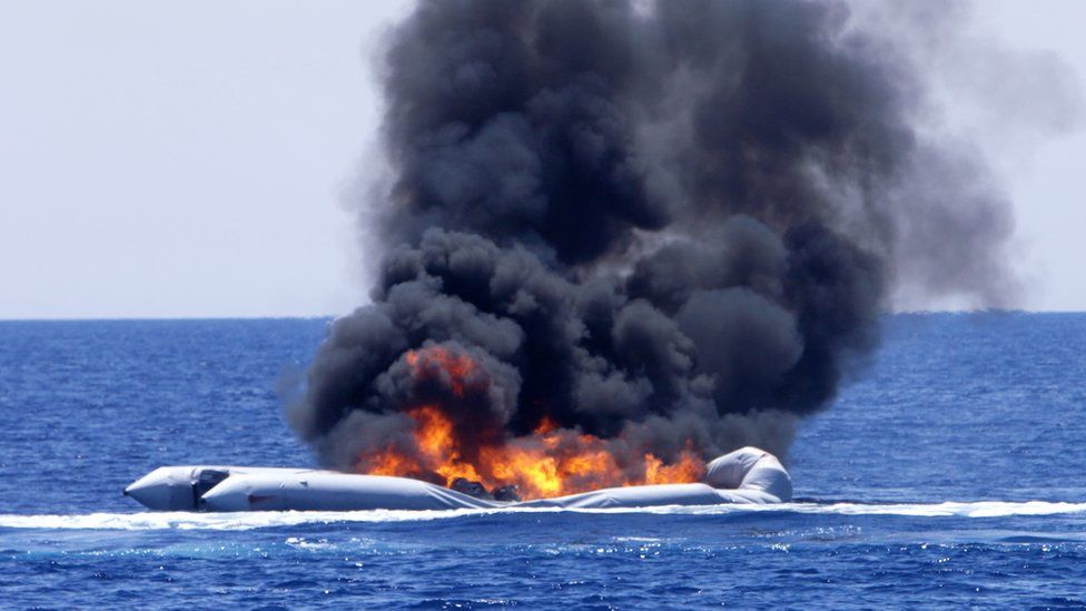 A boat is burned in the Mediterranean