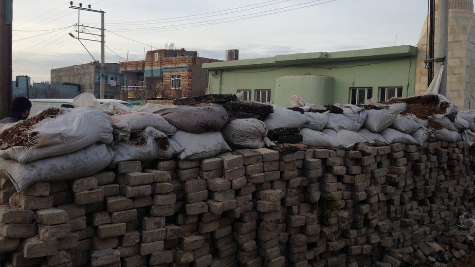Barricades with sandbags in the city of Nusaybin on the Syrian-Turkish border