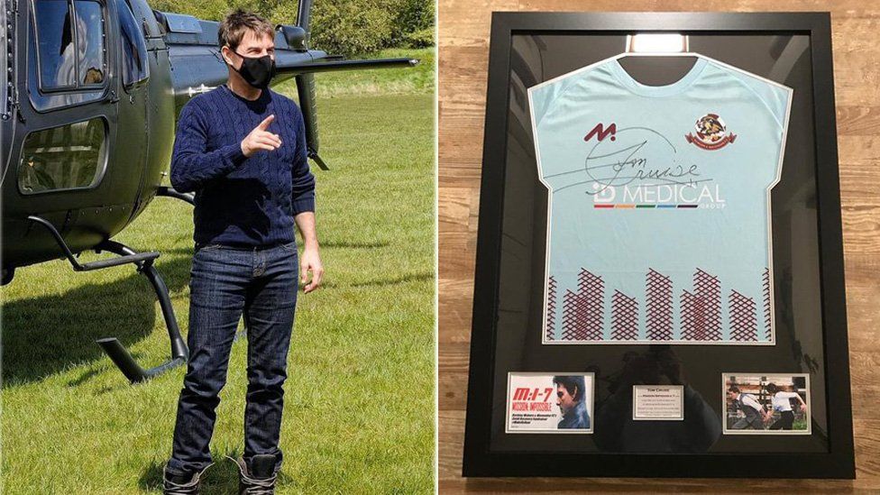 Tom Cruise, left, and one of the signed shirts