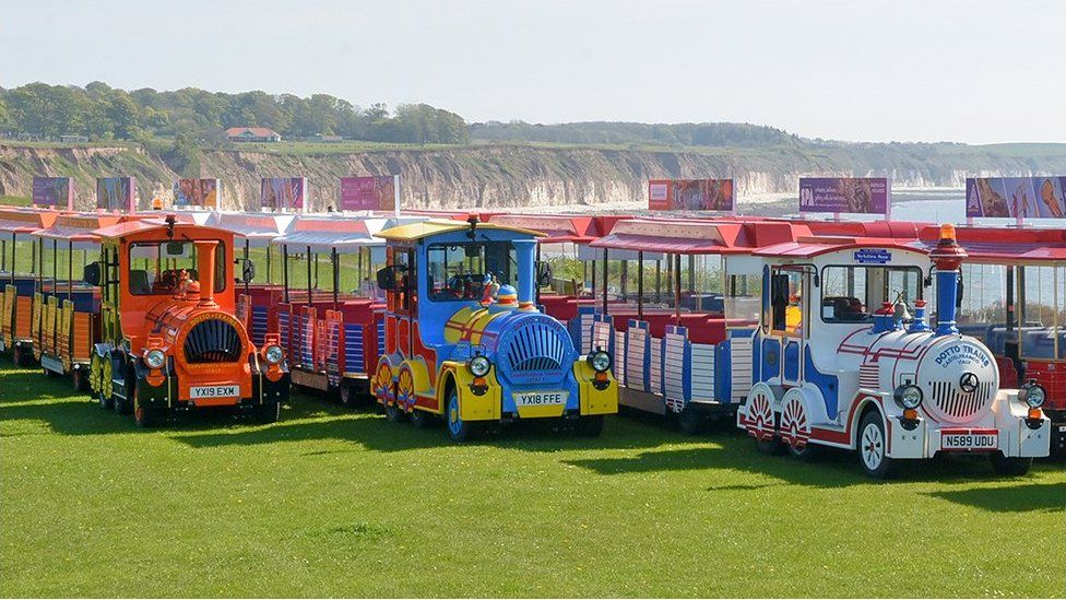 Land trains by the sea