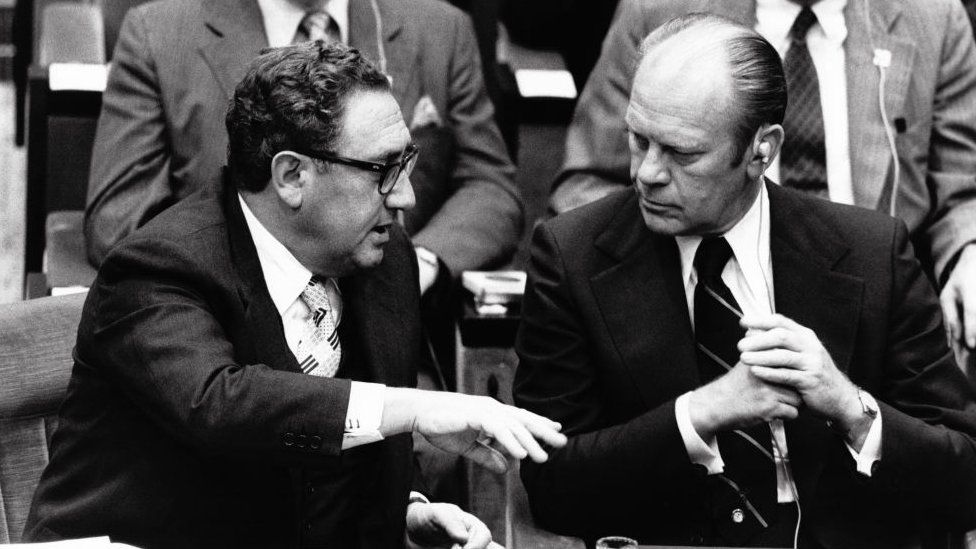 Henry Kissinger and President Gerald Ford at a summit in Paris