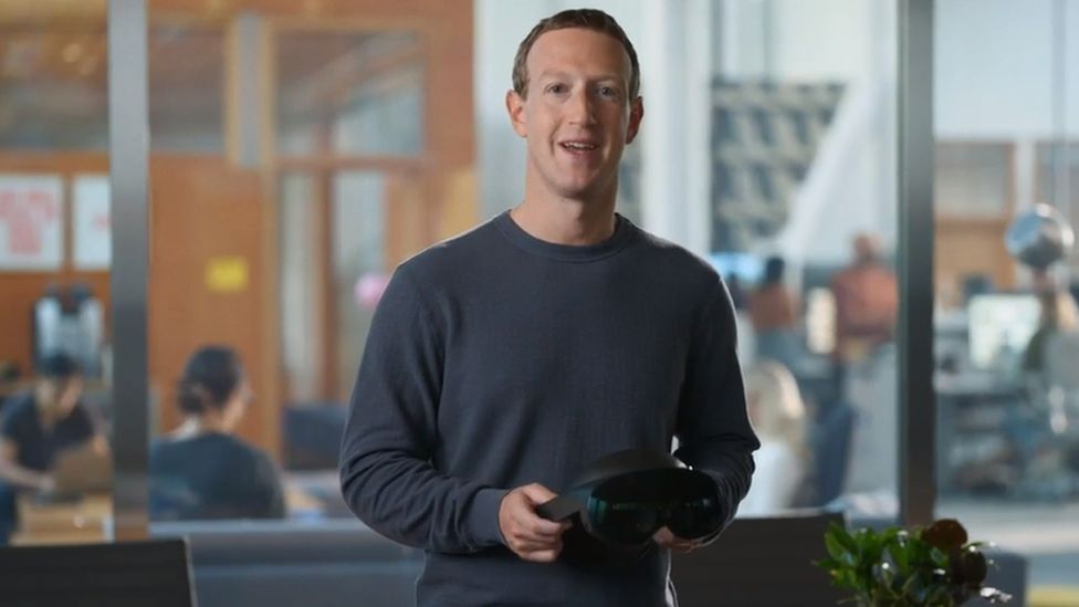 Mark Zuckerberg poses with the Meta Quest Pro