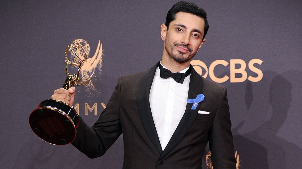 Ahmed with his Emmy Award for The Night Of in 2017