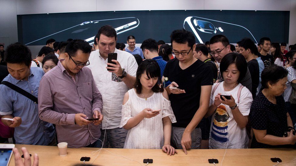 Customers in Apple's Shanghai store