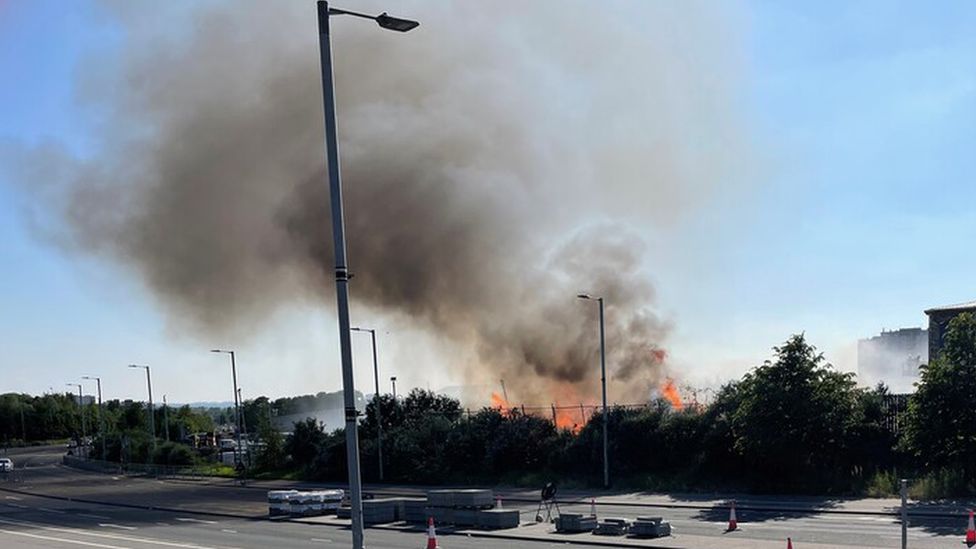 Crews tackle fire at recycling centre in Glasgow - BBC News