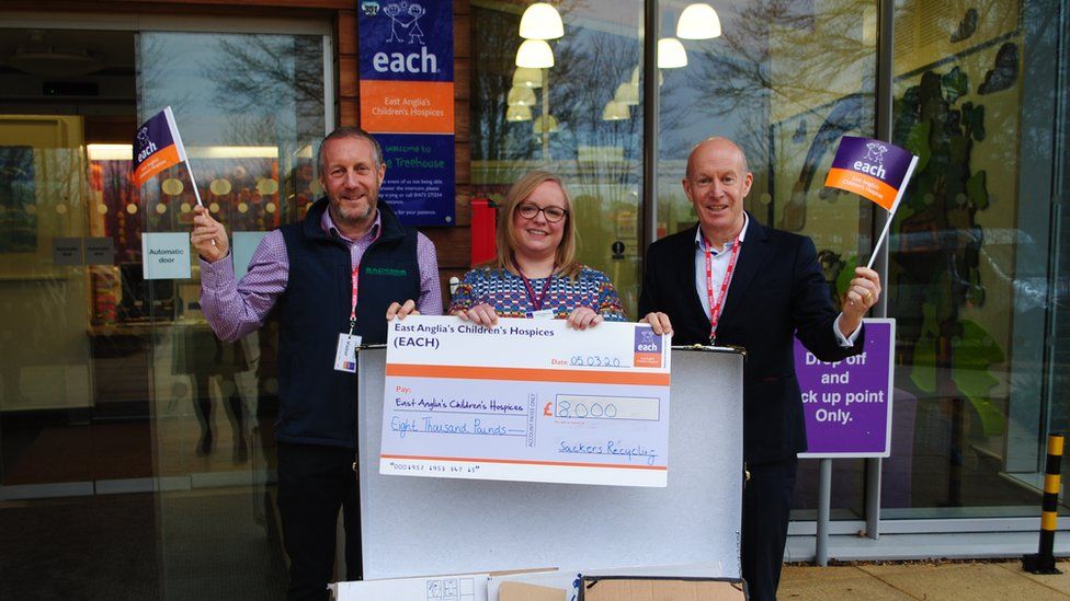 East Anglian Children's Hospice with a cheque