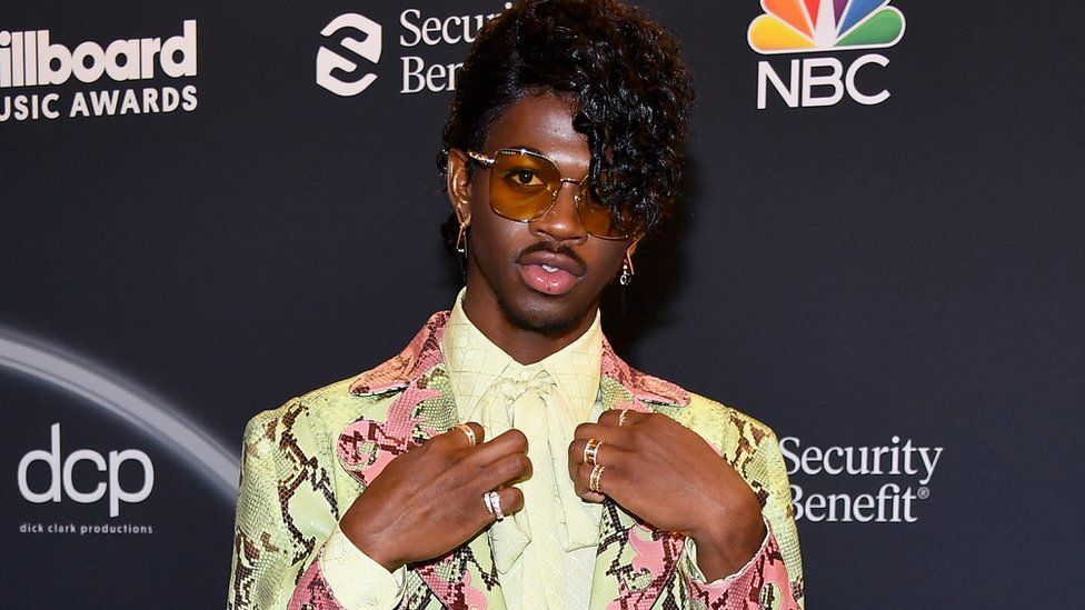 Lil Nas X shares defiant message as he tops US chart - BBC News