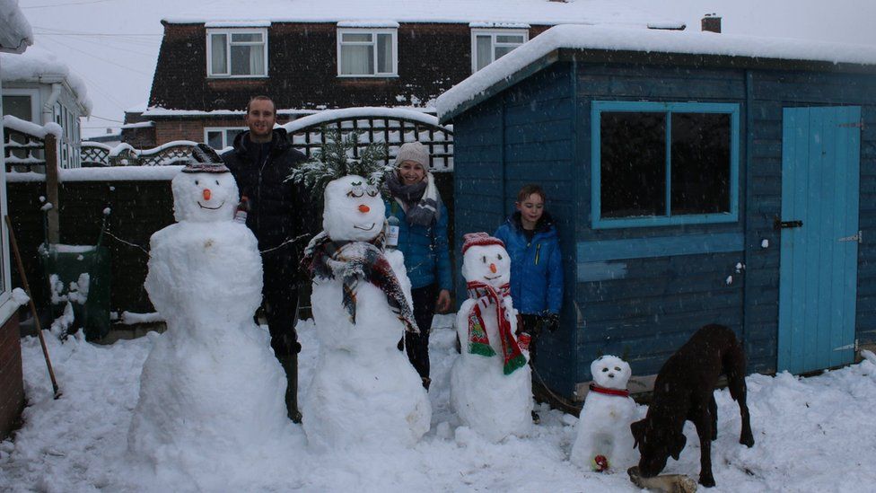 The Jones family with their snowmen