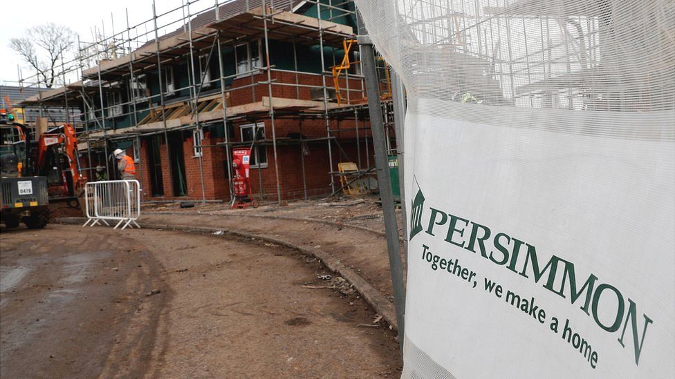 Builders working on a Persimmon site