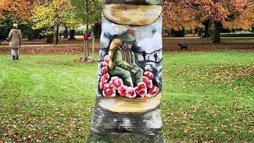 A soldier painted on a tree