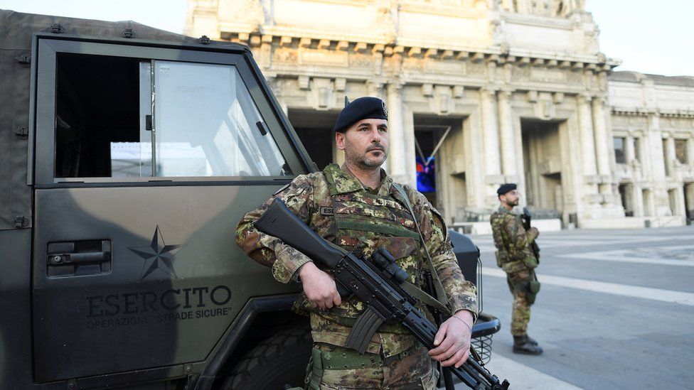 Soldiers patrol the streets in Lombardy