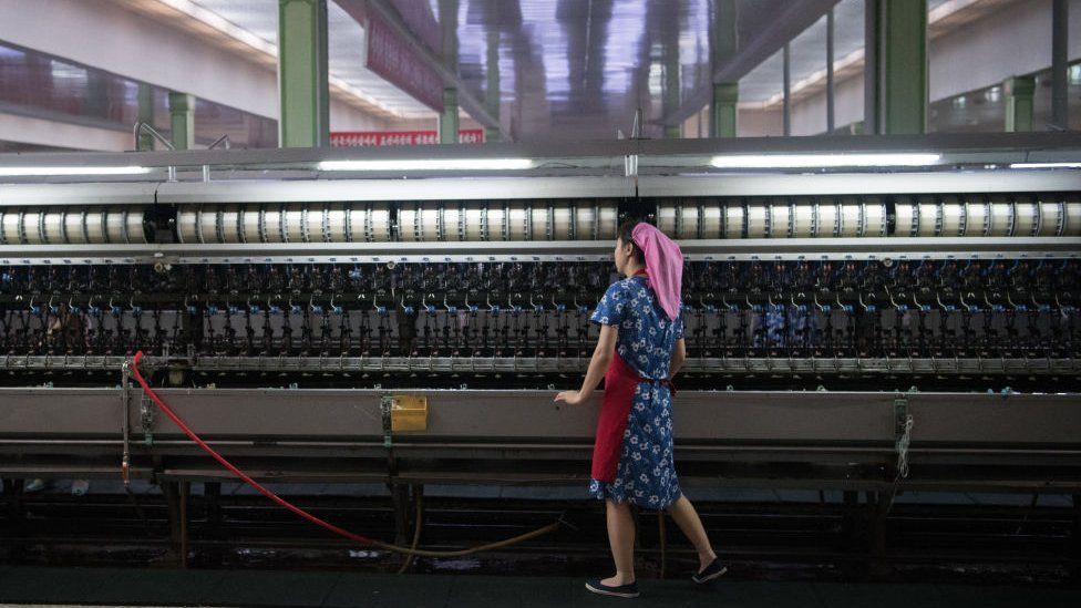 A woman works in the Kim Jong Suk Silk Factory on August 21, 2018 in Pyongyang, North Korea