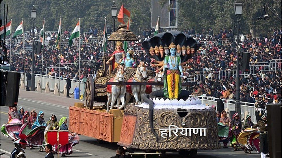 Artists perform beside the tableaux of Haryana state during the full dress rehearsal of the Republic Day Parade 2023, at Kartavya Path, on January 23, 2023 in New Delhi, India